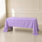 Lavender lilac rectangular tablecloth draped over a table in a bright room.