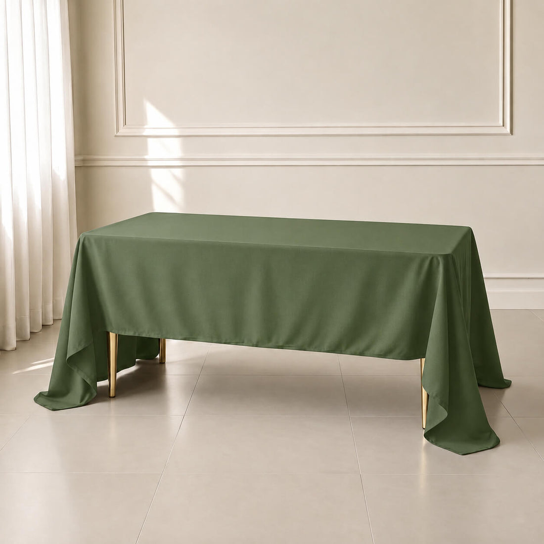 Olive green polyester tablecloth 60"x126" on a table. Durable and wrinkle-resistant.