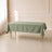Dusty sage green rectangle tablecloth on a table.