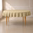 Champagne round tablecloth with linen texture on a table.
