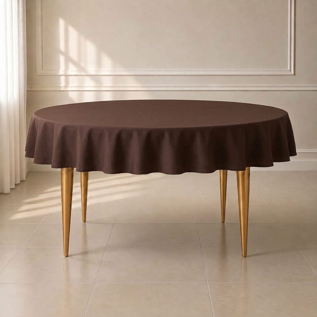 Chocolate round tablecloth with linen texture on a table.
