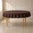 Chocolate round tablecloth with linen texture on a table.