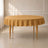 Gold round tablecloth with linen texture for sophisticated everyday decor.