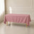 Dusty rose polyester rectangle tablecloth 72"x120" with wrinkle-resistant finish.