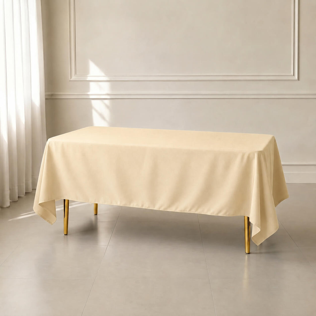 Beige wrinkle-resistant polyester tablecloth 72"x120" for elegant dining.