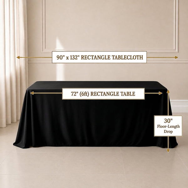 Black polyester rectangle tablecloth for elegant wedding receptions.
