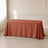 Terracotta rectangle tablecloth on a table with seamless finish.