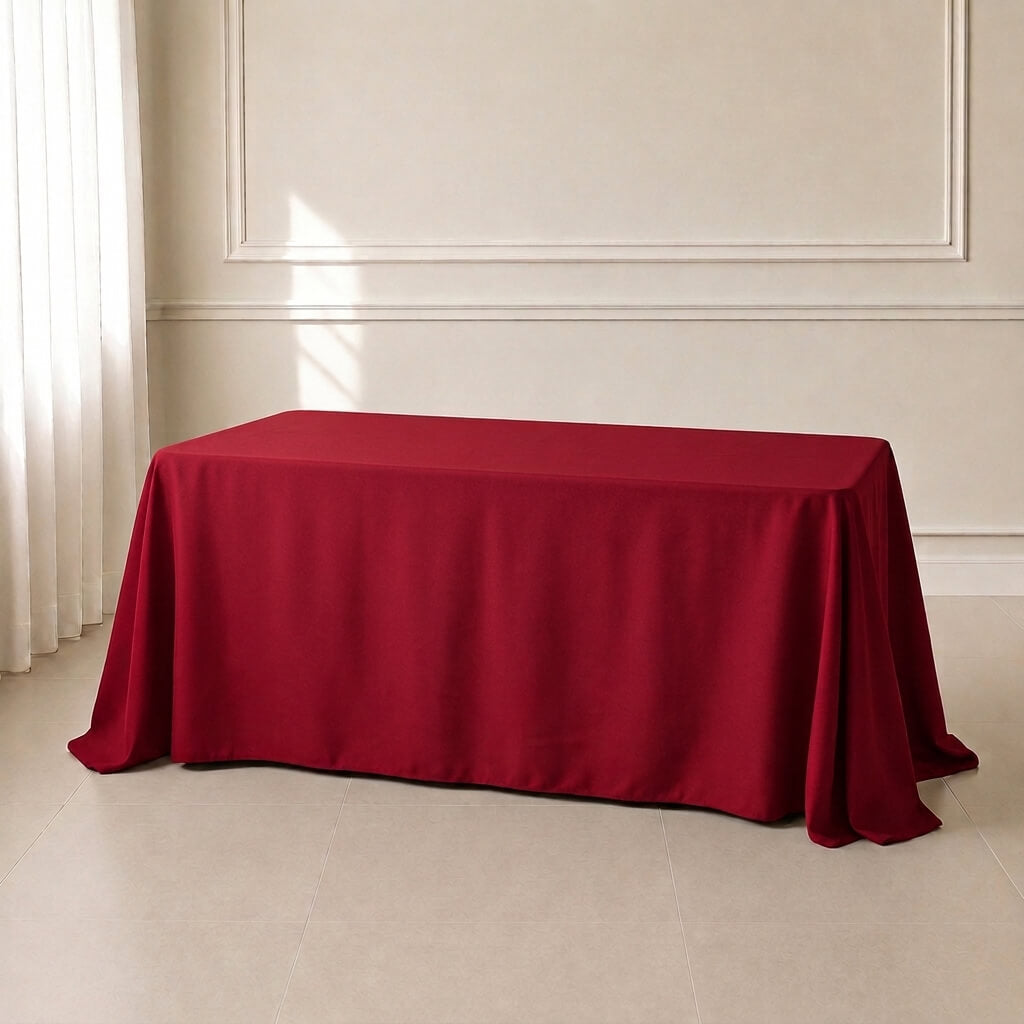Wine polyester rectangle tablecloth 90"x132" with seamless finish.