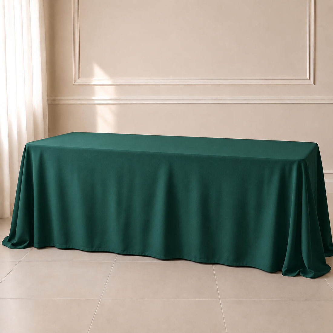 Hunter emerald green polyester tablecloth on a rectangular table.