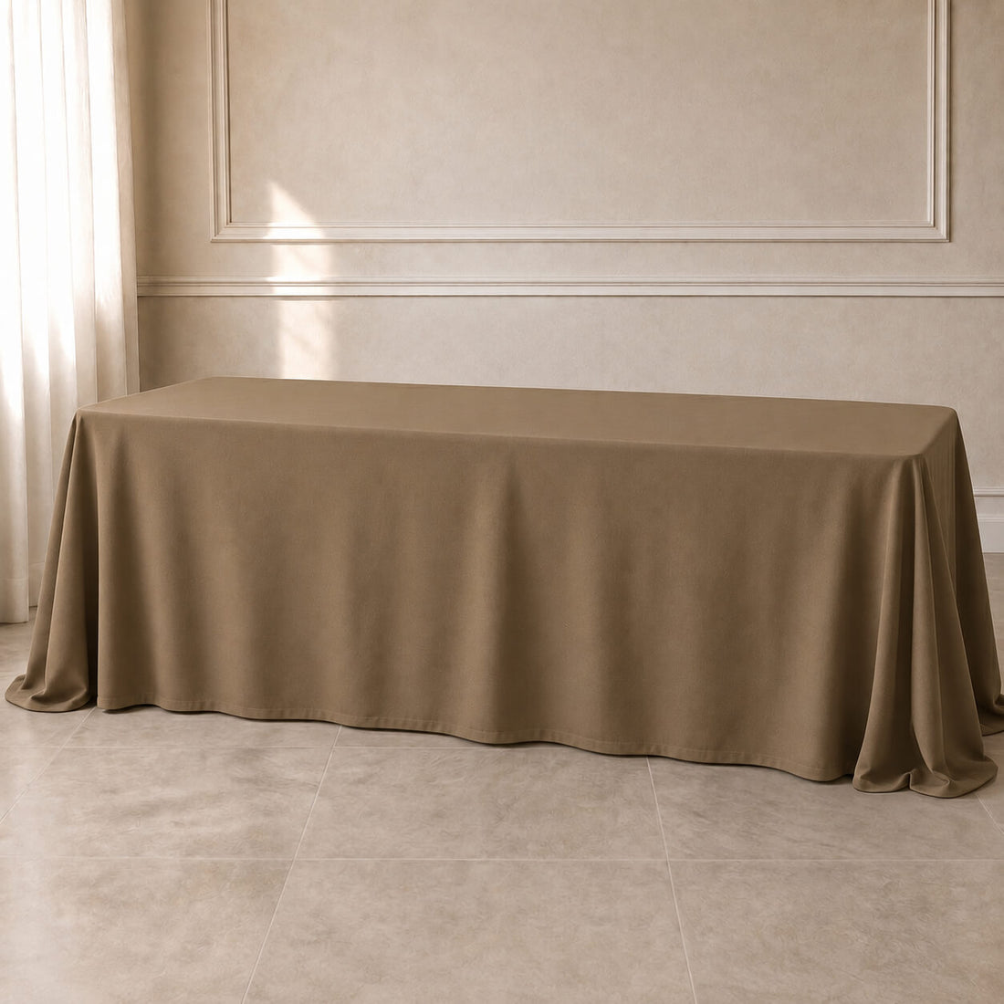 Taupe seamless polyester rectangle tablecloth 90"x156" on a table.