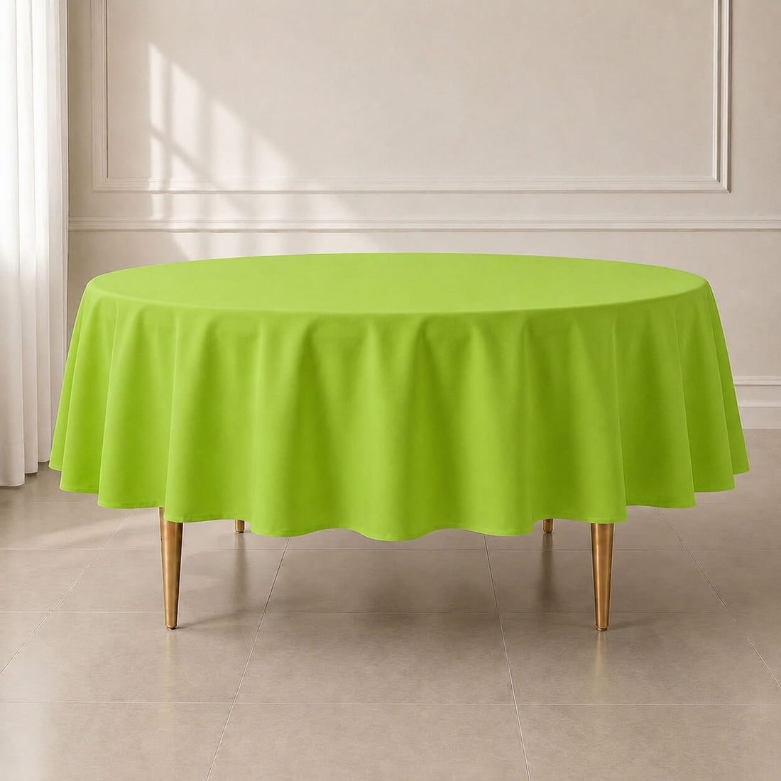 Apple Green Round Tablecloth on a table in a bright room.