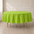Apple Green Round Tablecloth on a table in a bright room.