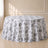 White round tablecloth with black French toile pattern for elegant events.