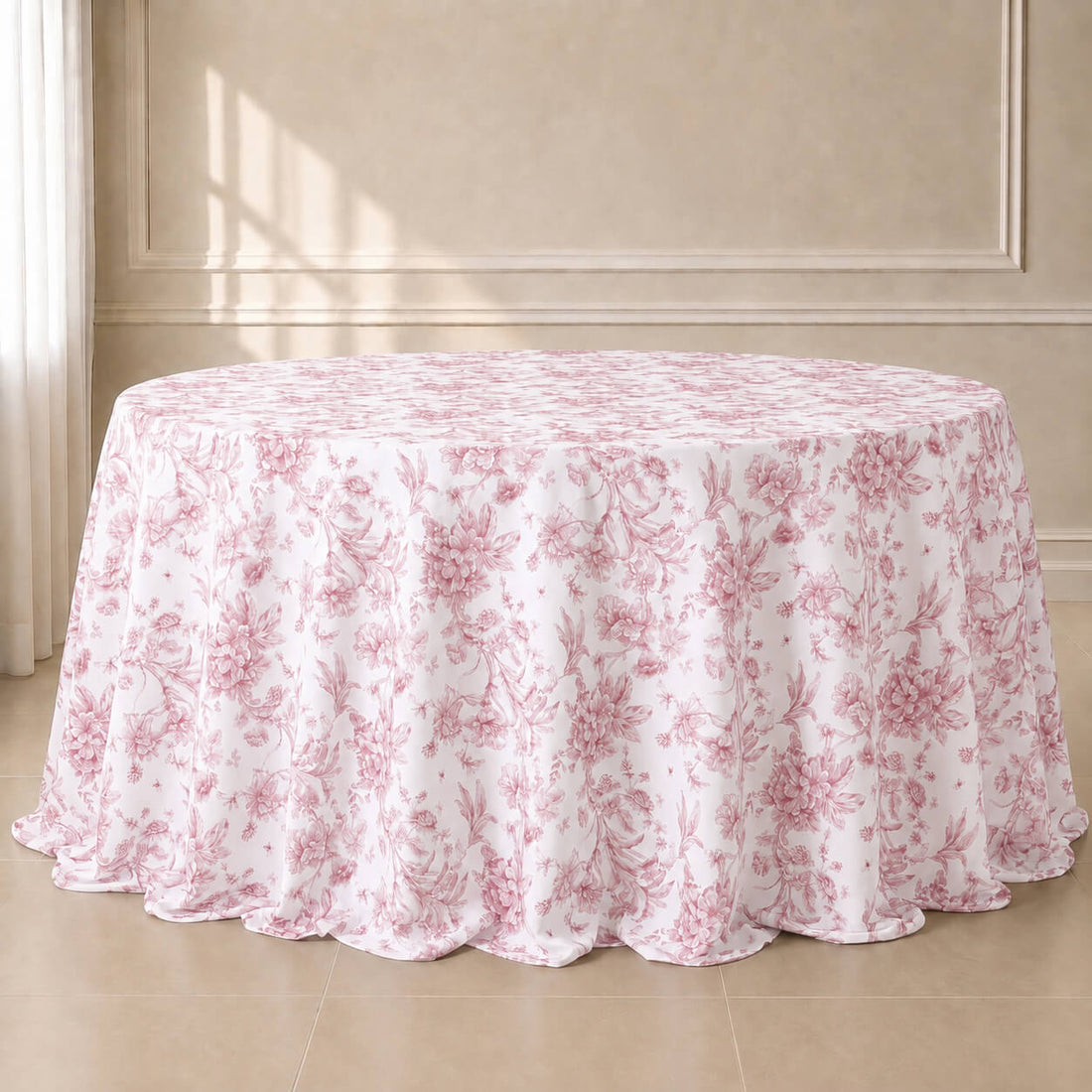 White round tablecloth with pink French toile pattern for elegant events.