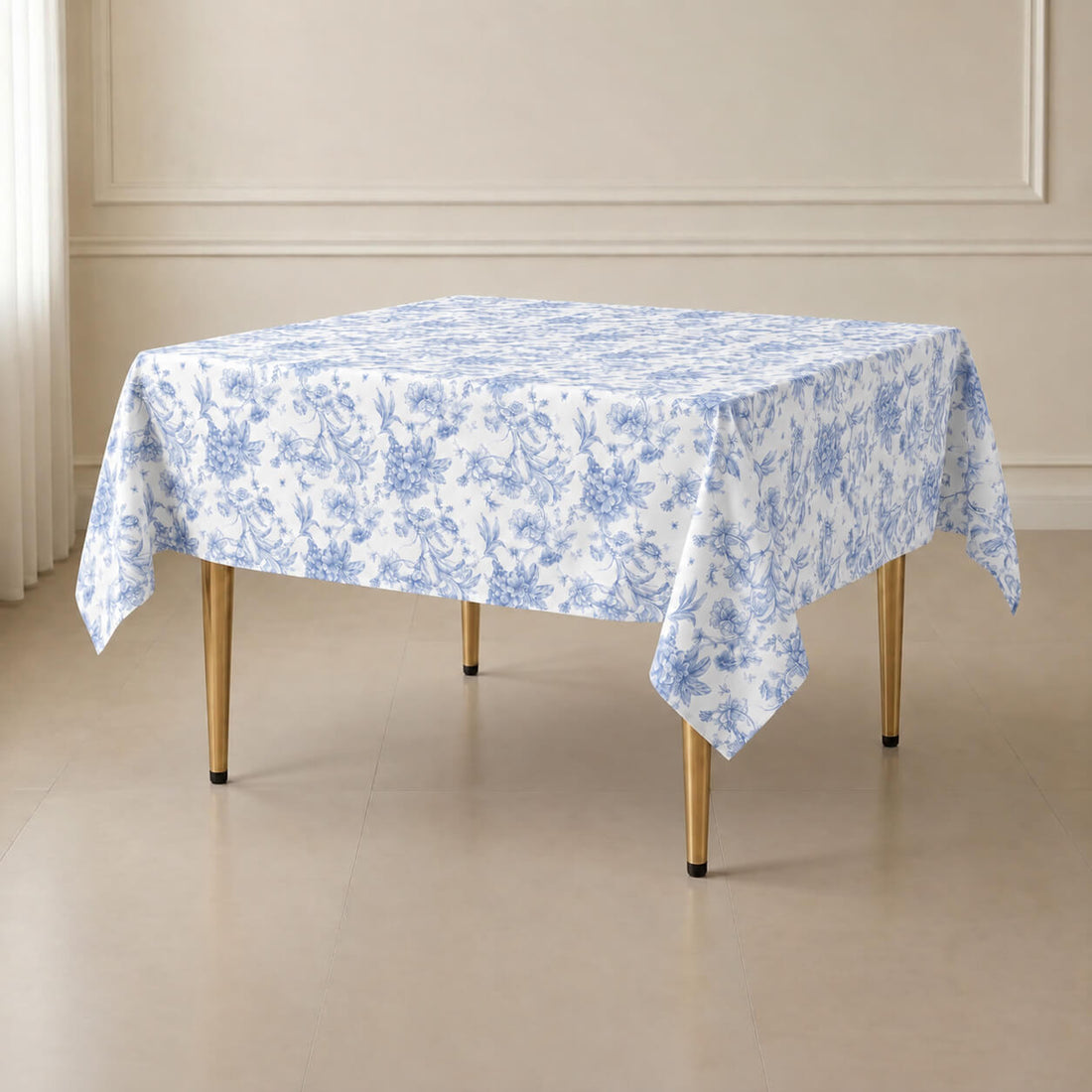 White table overlay with blue French toile pattern for weddings and events.
