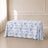 White tablecloth with blue French toile pattern for elegant events.