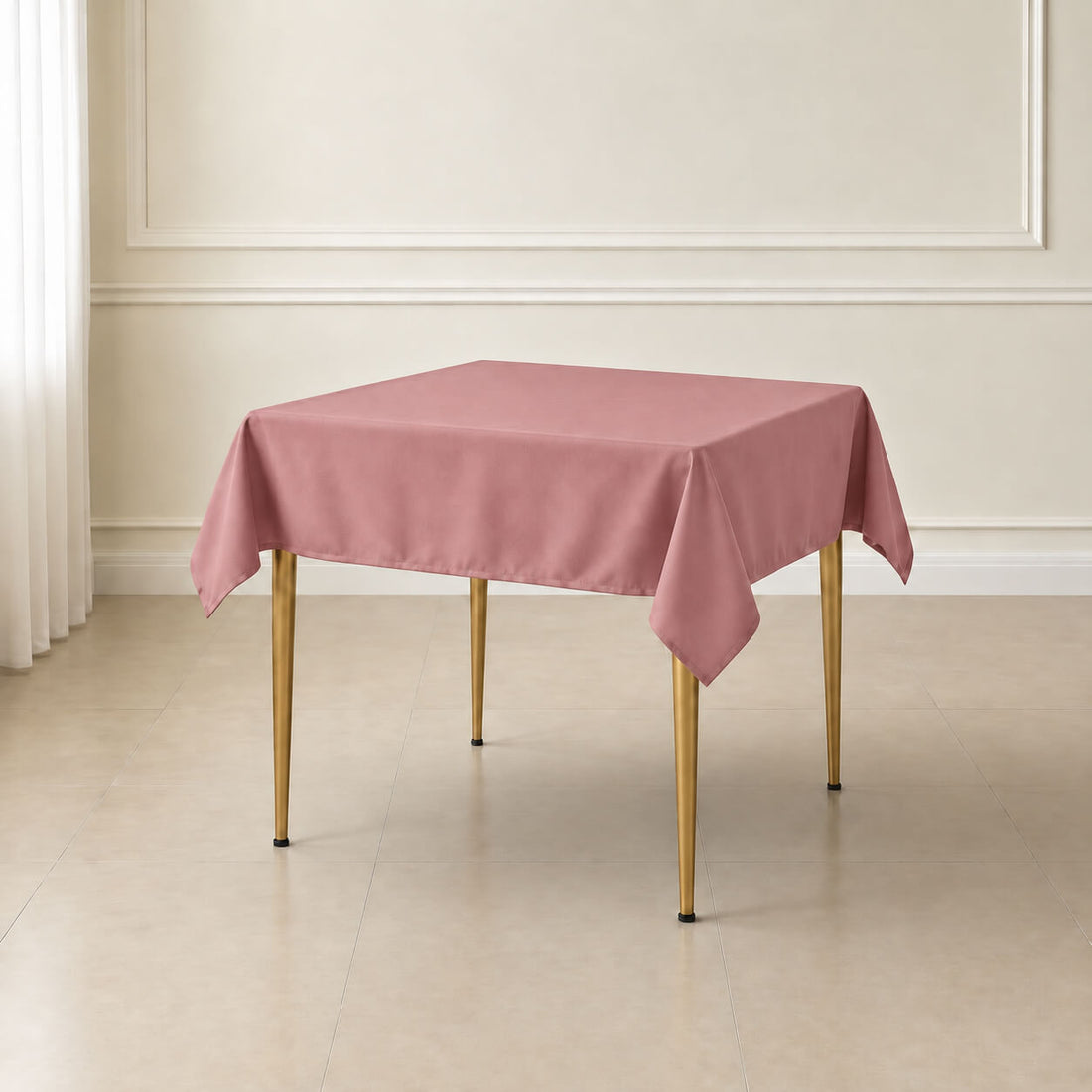 Dusty rose wrinkle-resistant square tablecloth 54"x54" on a table.