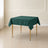Hunter Emerald Green Square Tablecloth on a table.