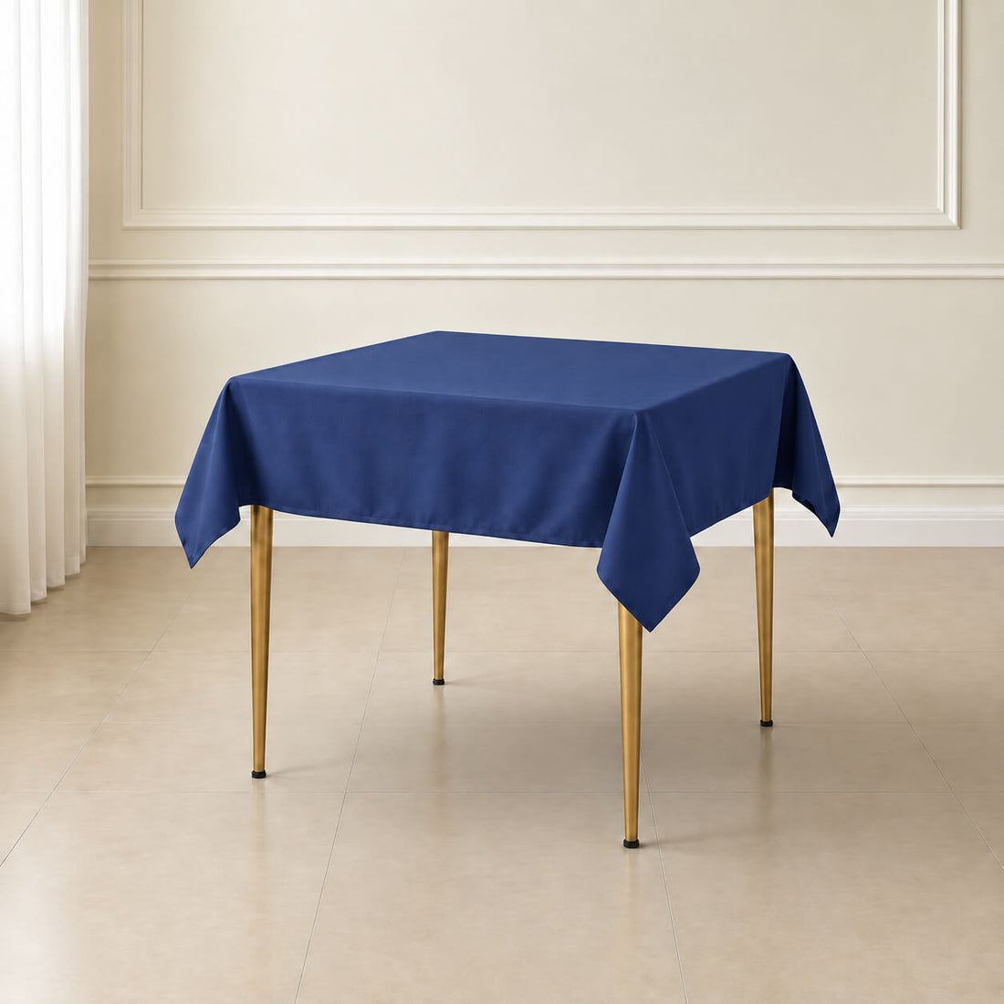 Navy blue wrinkle-resistant square tablecloth on a dining table.