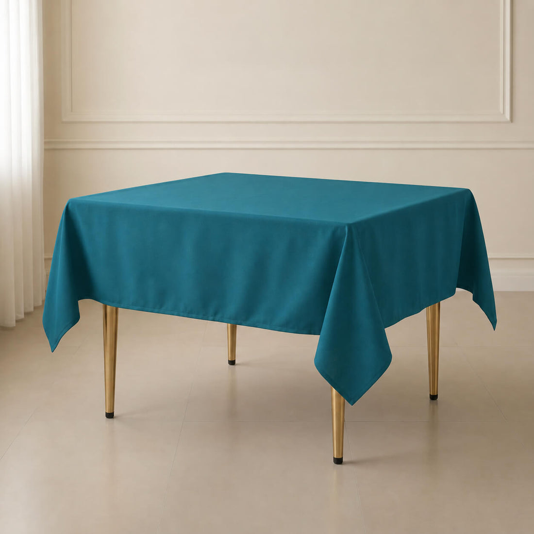 Peacock teal wrinkle-resistant table overlay on a square table.