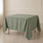 Dusty sage green polyester square table overlay on a table.