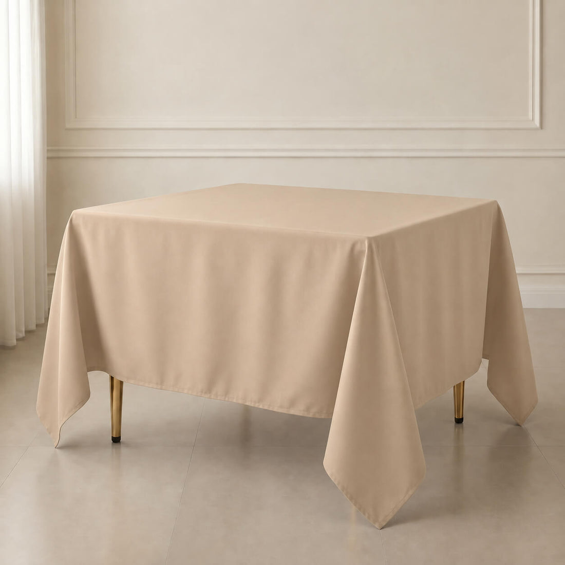 Nude wrinkle-resistant polyester square tablecloth on a table.