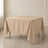 Nude wrinkle-resistant polyester square tablecloth on a table.