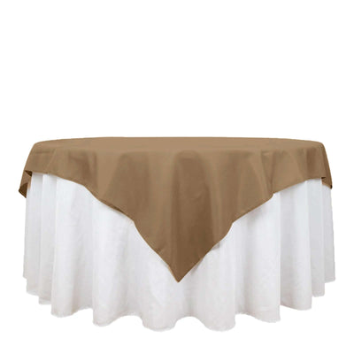 Brown tablecloth draped over a white table