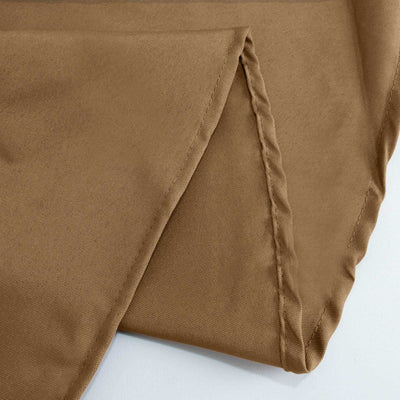 Brown fabric with smooth texture and folded edges.