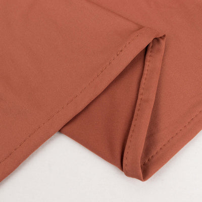 Rust-colored fabric with a smooth texture and clean edges.