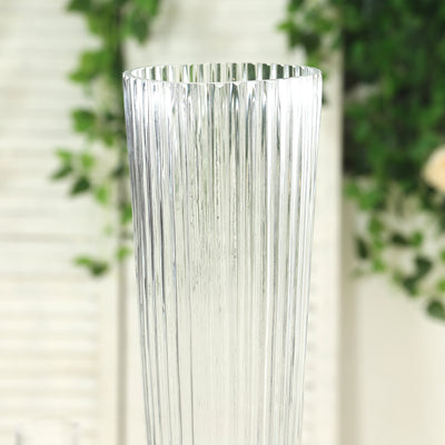 Elegant tall glass vase with vertical ribbed design.