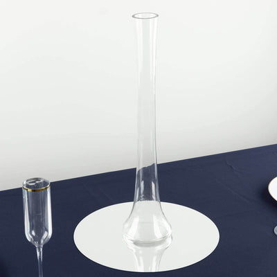 Clear glass vase with a sleek design, ideal for elegant floral arrangements.