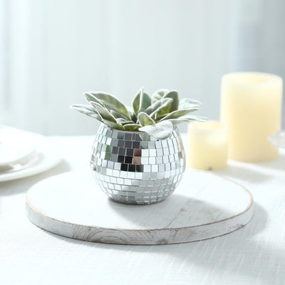 Mirror mosaic succulent planter with candles on a white wooden tray