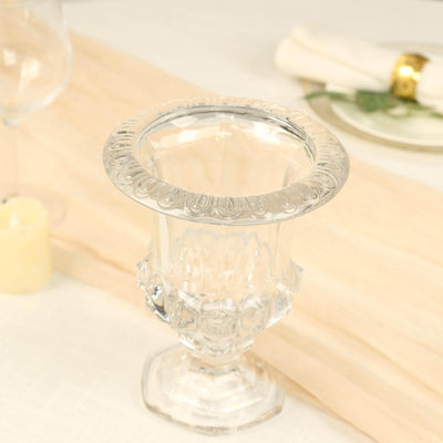 Elegant crystal vase with intricate detailing, perfect for floral arrangements.