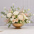 Elegant white and blush rose floral arrangement in a gold bowl vase
