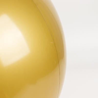 Shiny gold ball with a smooth surface and subtle reflections.