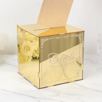 Gold wedding card box with elegant design and slot for cards.