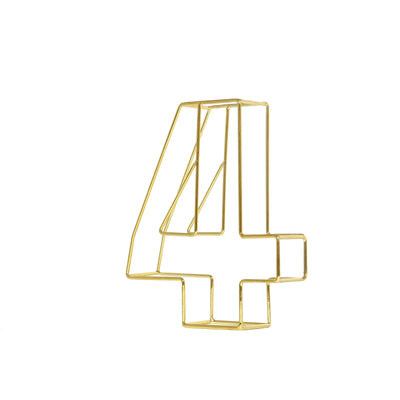 Gold wire number 4 decorative piece on a white background