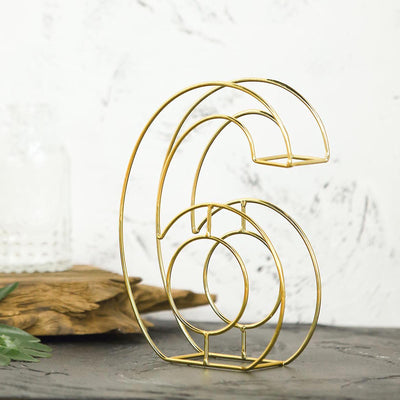 Gold wire number six decor piece