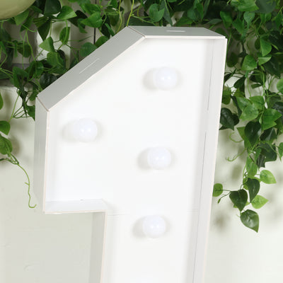 White marquee number one sign with light bulbs