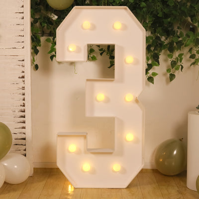 Light-up marquee number three with bulbs, perfect for celebrations and events.