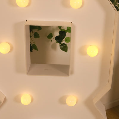 Octagonal light fixture with bulbs and an empty center for customization.
