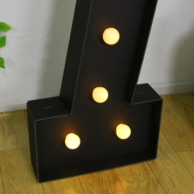 Black letter marquee with four warm LED bulbs.
