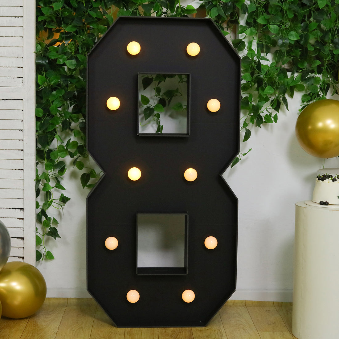 Large black marquee number 8 with lights, perfect for events and celebrations.