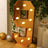 Gold marquee number 9 with lights, perfect for celebrations and events.