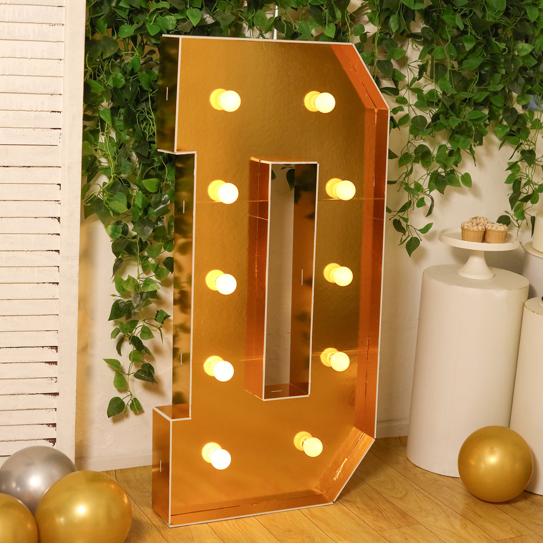 Gold marquee number 10 with lights, perfect for celebrations and events.