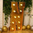 Gold marquee letter "N" with lights, perfect for events and decor.