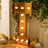 Gold marquee letter "I" with lights, perfect for events and celebrations.