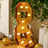 Golden marquee number 8 illuminated with bulbs, perfect for celebrations.