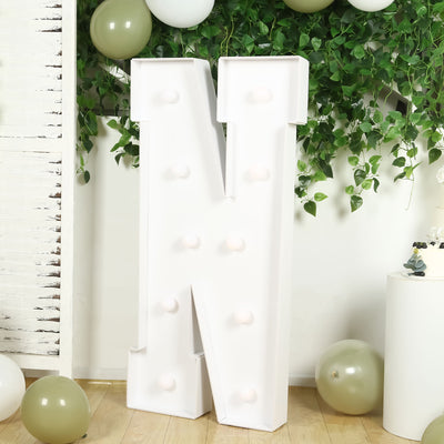 Large decorative letter "N" with lights, perfect for events or home decor.